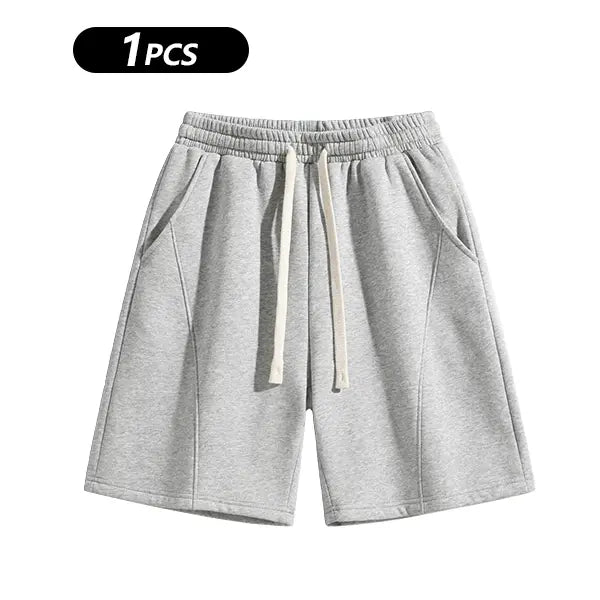 Men's Casual Cotton Shorts Ideal for Workouts, Jogging, and Everyday Lounging at Home. Soft against the Skin with Moisture-Wicking Properties. Features a High-Stretch Drawstring Waistband for Adjustable Fit. Relaxed Straight-Leg Silhouette