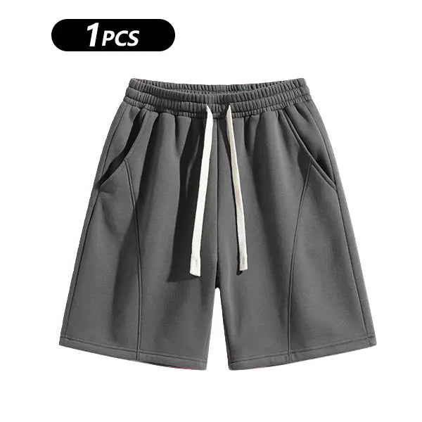 Men's Casual Cotton Shorts Ideal for Workouts, Jogging, and Everyday Lounging at Home. Soft against the Skin with Moisture-Wicking Properties. Features a High-Stretch Drawstring Waistband for Adjustable Fit. Relaxed Straight-Leg Silhouette